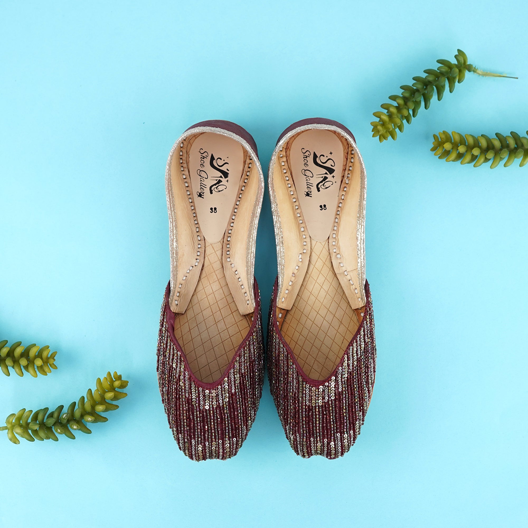 Maroon embalish lather Khussa